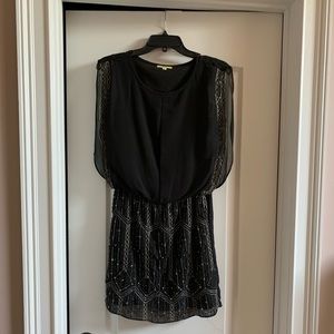 Black beaded dress by Gianni bini
